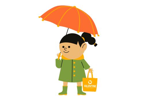 Girl holding orange umbrella carrying a Valentine Public Library green tote.
